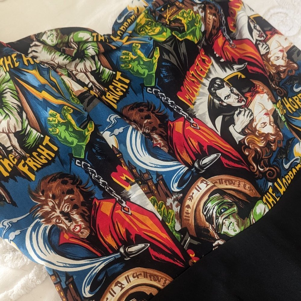 Vintage-Inspired Black Midi Dress with Multi-Color Horror Print - Picture 3 of 7